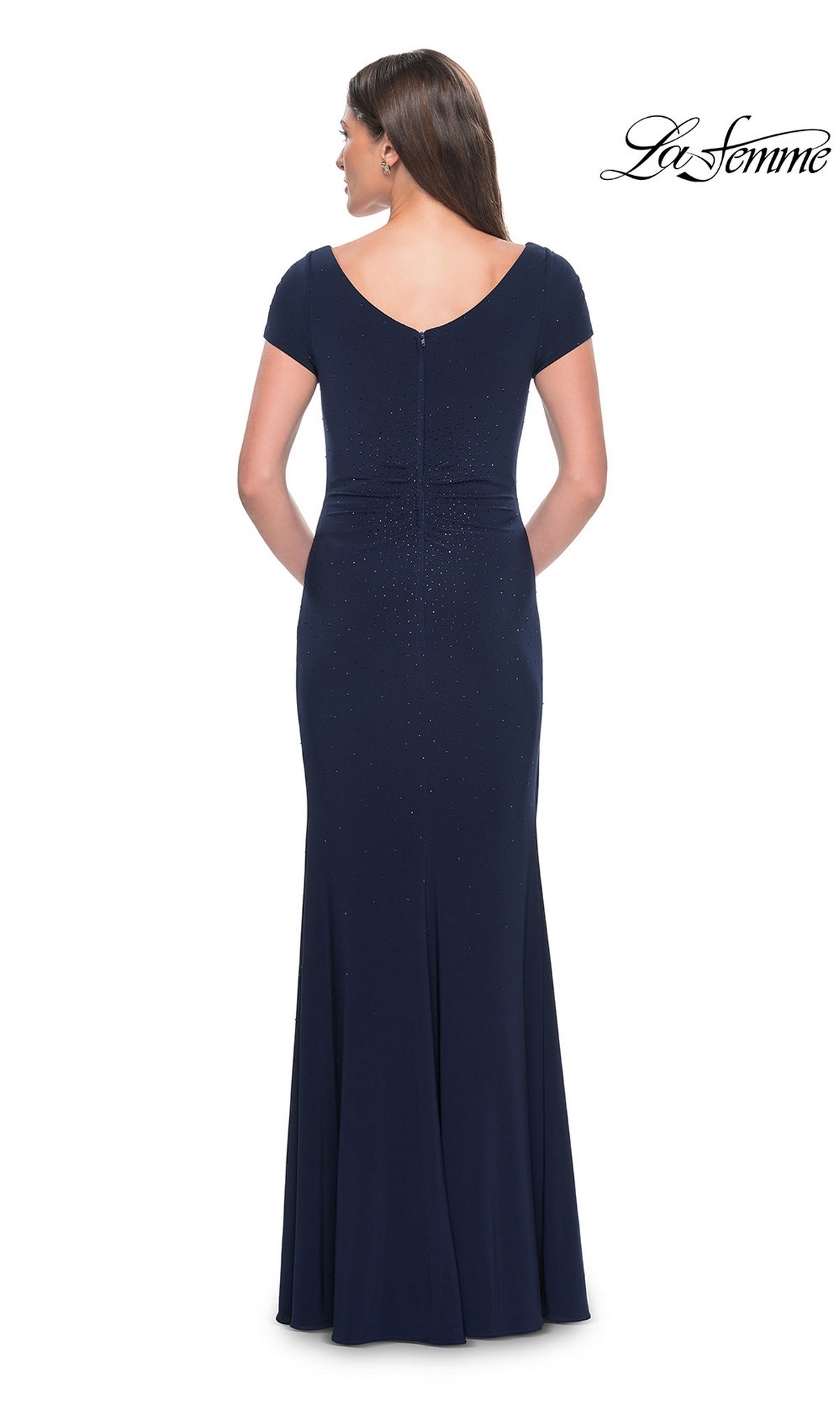 Back view of a Long Formal Dress: La Femme 31773, a dark blue jersey gown with cap sleeves and subtle sparkling embellishments.